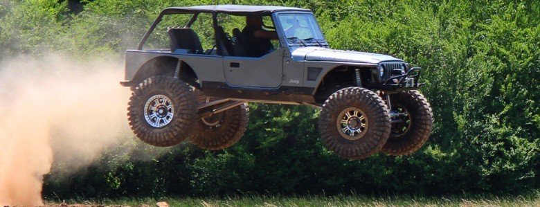 What Automotive giant currently owns Jeep?