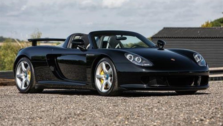 AWESOME PORSCHE CARRERA GT AND A FABULOUS FERRARI 512 BB TO STAR AT MARQUE AUCTIONS
