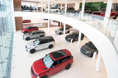 How can I become a luxury car dealer?