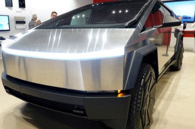 Why Elon Musk's Tesla Cybertruck will NEVER be available to buy in the UK: Premier League footballers' favourite car salesman reveals the truth