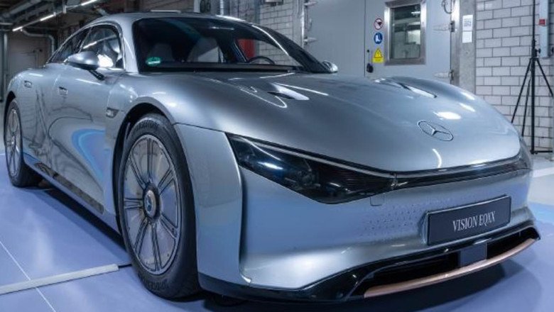 Electric car range problems could be solved by new solar paint that charges them from the skies... But it won't be available for 15 YEARS