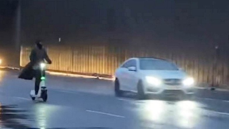 Shocking moment masked e-scooter rider travels down busy motorway at 10mph during Storm Darragh