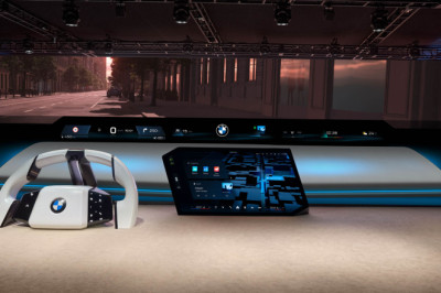 Next-gen BMW iDrive debuts with no buttons, pillar-to-pillar projection