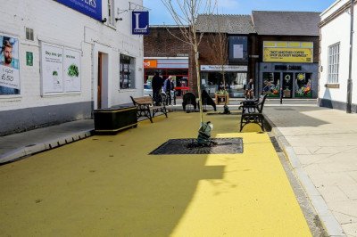 Where the streets have no shame! Families blast embarrassing town square after council painted it custard yellow