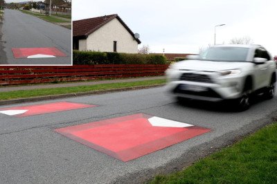 Motorists left bemused as FAKE speed bumps are painted onto road as part of bizarre traffic calming scheme
