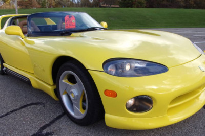 A Bright Yellow Viper With A Giant Wing Is Basically The 1990s On Four Wheels