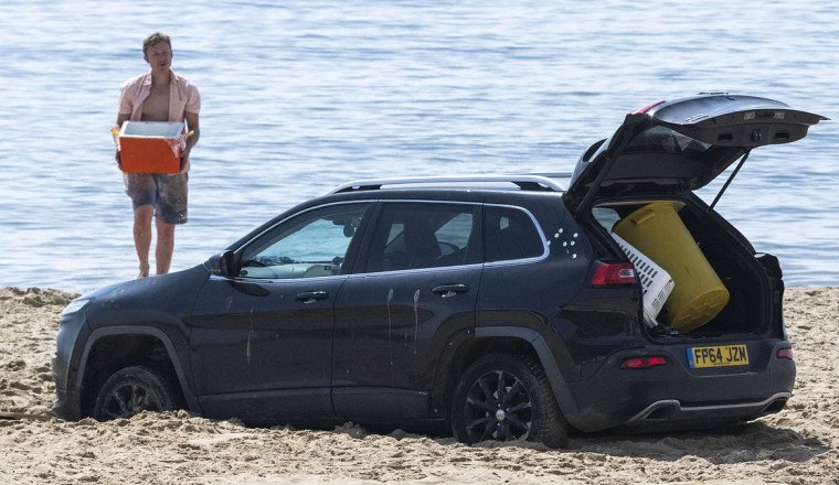 There's plenty more fish in the sea! Hapless romantic's first date goes horribly wrong when his car gets STUCK on beach
