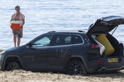 There's plenty more fish in the sea! Hapless romantic's first date goes horribly wrong when his car gets STUCK on beach