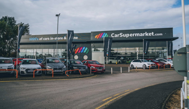Used dealer CarSupermarket.com sees profits cut in half but bosses ‘pleased’ with performance