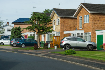 Is it illegal to park across a home driveway?