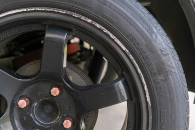 Curb Rash Ruining Your Rims? Your Tire Choice Could Be The Culprit
