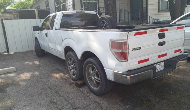 This Basic Ford F-150 Work Truck Has Six Wheels and Someone’s Hopes and Dreams