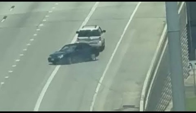 Houston SUV tows car backwards