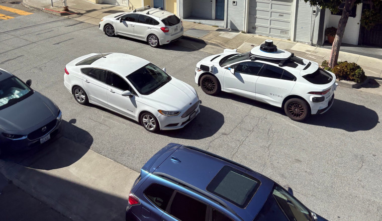 Seeking solitude and safety, riders flock to robotaxis driven by computers