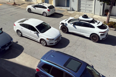 Seeking solitude and safety, riders flock to robotaxis driven by computers