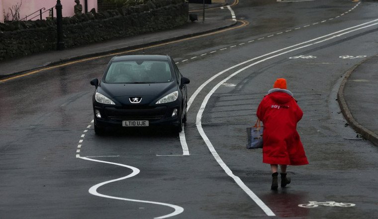 Britain's daftest road markings are finally removed after council spent £1.5m on wiggly lines that left drivers and cyclists baffled