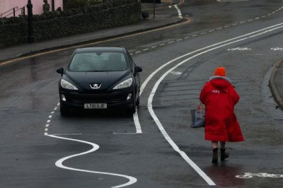 Britain's daftest road markings are finally removed after council spent £1.5m on wiggly lines that left drivers and cyclists baffled