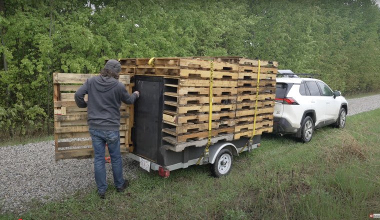 Why Buy A Camper When You Could Build A Stealthier One Out Of Pallets Yourself?