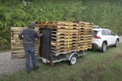 Why Buy A Camper When You Could Build A Stealthier One Out Of Pallets Yourself?