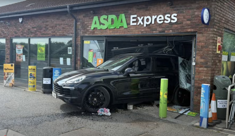Police investigating after used car dealer’s stolen Porsche is used in shocking ram raid
