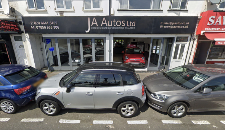 Used car dealer celebrates special anniversary after 20 years in business as a ‘one-man band’