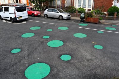 Locals baffled as mystery green spots appear on street overnight - but what are they for?
