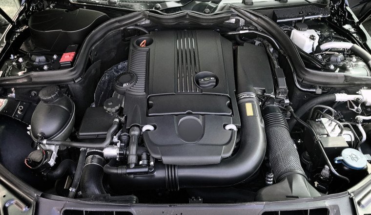 Your Car's Engine Bay Is A Plastic Mess And Here's Why
