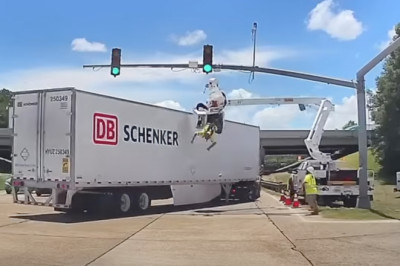 Big Rig Clips Bucket Truck Leaving Worker Dangling For Dear Life