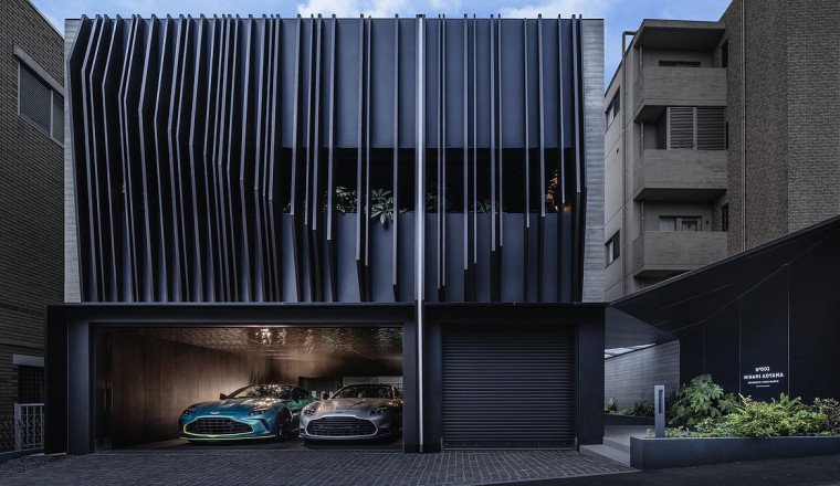 The house Aston Martin built: British car firm unveils luxury Tokyo mansion... with a lavish garage