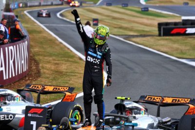 Piastri penalty costs him British GP win to Norris in hectic race
