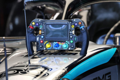 What's behind Russell's steering wheel change