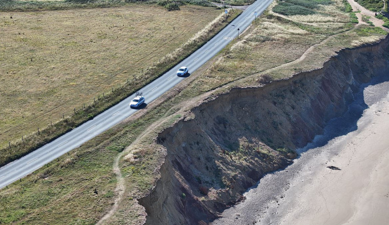 Fears one of Britain's most scenic roads just four metres from a cliff edge could crumble into the sea as drivers call it 'an accident waiting to happen'