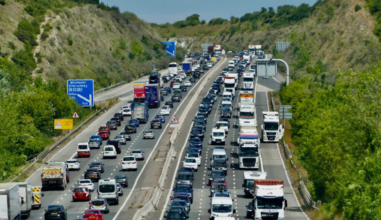Record number of summer getaway journeys to cause 'midweek mayhem' with 14million set to hit the roads in the next four days... which routes should YOU avoid?