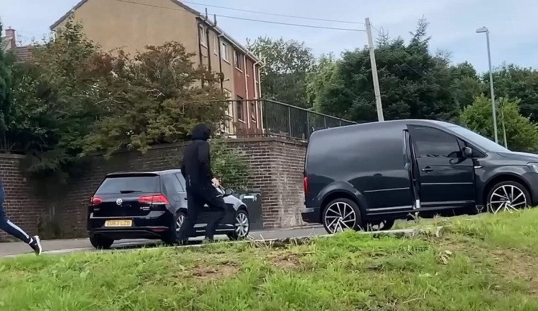 Moment thieves flee street in stolen car - after breaking into family home to grab the keys
