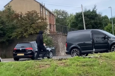 Moment thieves flee street in stolen car - after breaking into family home to grab the keys