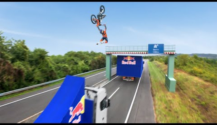 World First! Motorbike Flip Between Two Moving Trucks