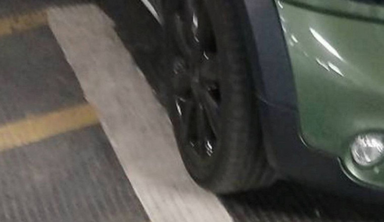Mum slams 'ridiculous' £100 fine for parking car two inches over white line