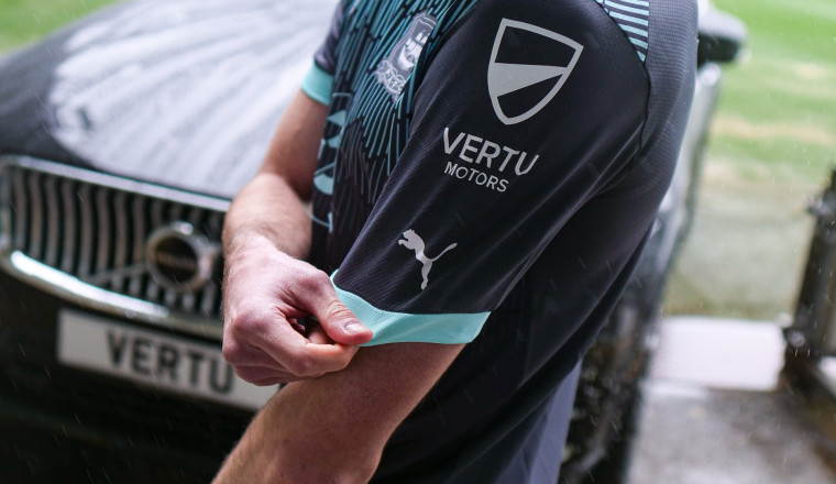 Vertu on track to meet profit expectations as car dealer welcomes Electric Car Grant