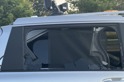 Man Attacks Police Photo Enforcement Van, Gets Caught On Camera