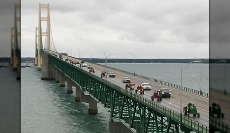 More Than 1,000 Antique Tractors Parade Across Michigan's Mackinac Bridge