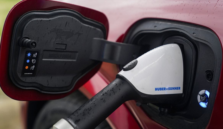 Oil giant says new liquid solution can cut electric car charging times to less than 10 minutes - here's how