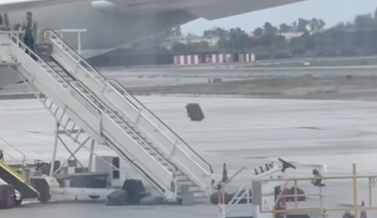 Don't Automatically Freak Out If You See A Worker Just Yeeting Things Out Of A Plane