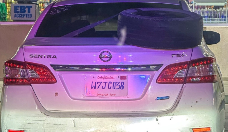 The Artist Behind This Nissan’s Homemade License Plate Did Their Best, But Still Got Caught