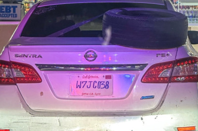 The Artist Behind This Nissan’s Homemade License Plate Did Their Best, But Still Got Caught