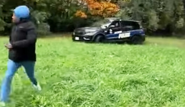 Police Officer Caught On Video Trying To Run Down A Man