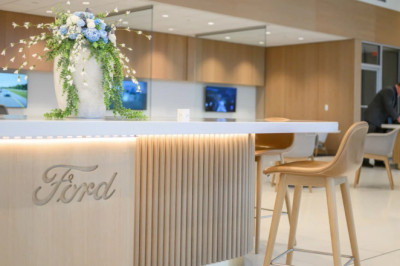Ford’s New Dealership Design Is Part Hotel Lobby, Part Apple Store