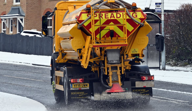 Go out and grit your own roads, taxpayers told: Homeowners given salt, hi-vis jackets, and gloves by councils after tax hike