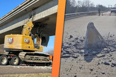 Excavator in Transport Hits Bridge So Hard the Arm Punches Through the Road Above