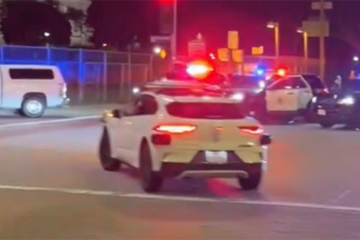 Robotaxi Rolls Through LAPD Crime Scene As Suspect Is Held At Gunpoint