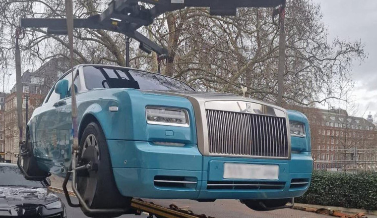 Saudi-registered £250,000 Rolls-Royce is towed away in new Mayfair crackdown on illegally parked supercars after rich owners ignored parking tickets